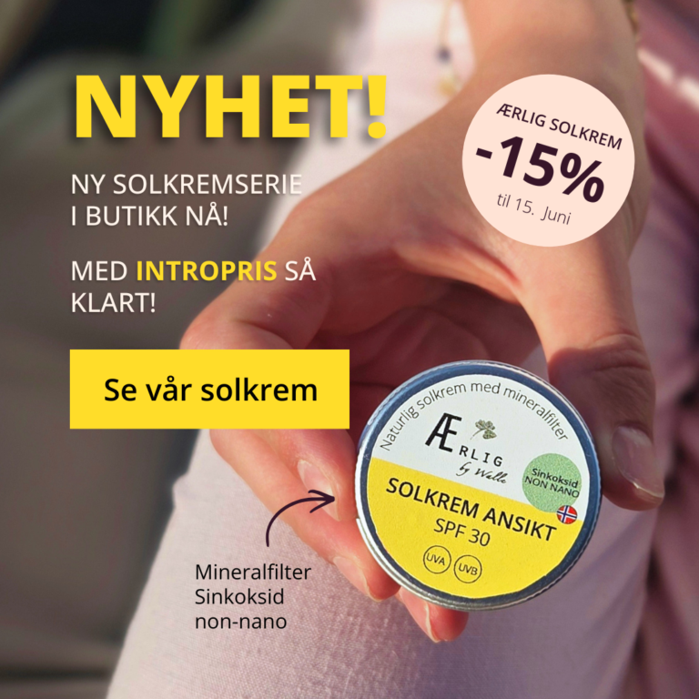 hånd holder solkrem fra ærlig by walle