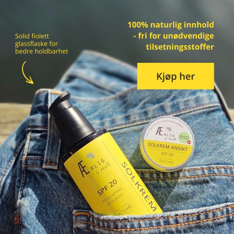 To produkter fra ærlig by walle på jeans på kai med sjø i bakgrunn